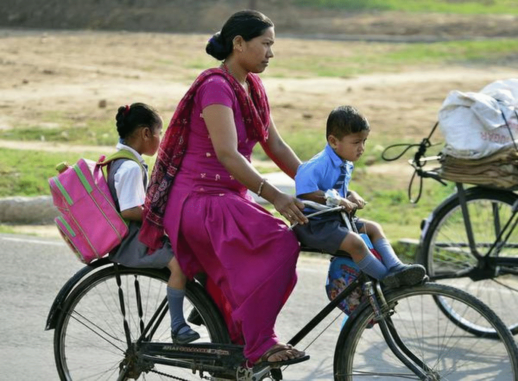 two kids riding with the mother